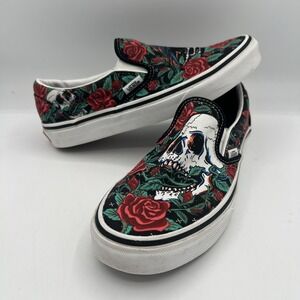 VANS Unisex Black/Rose Skulls Slip-On Skateboarding Shoe Men's 5 Women's 6.5
